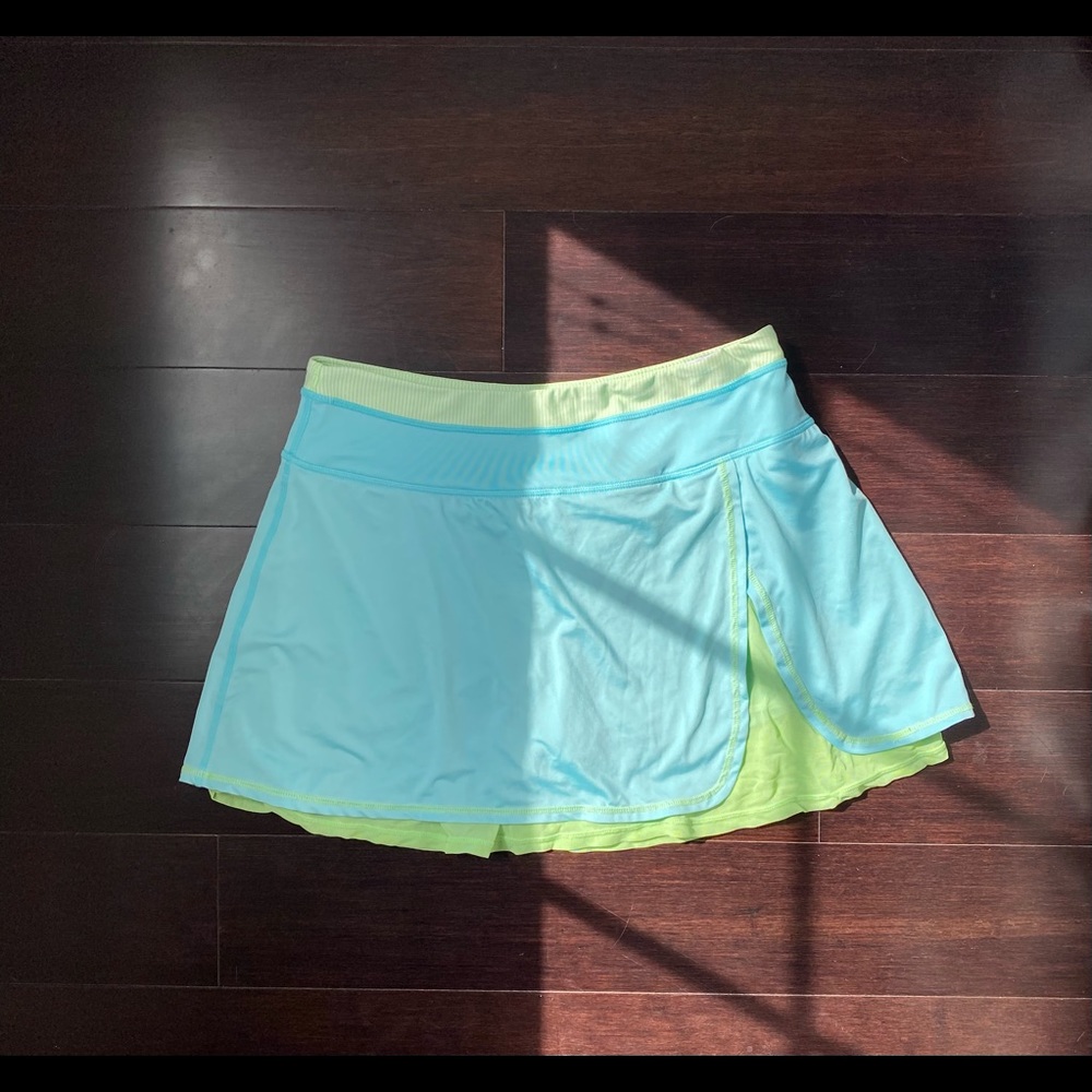 Kyodan athletic skirt in turquoise blue/lime green